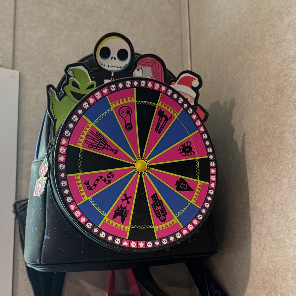 Spooky Character Wheel Backpack - image 1